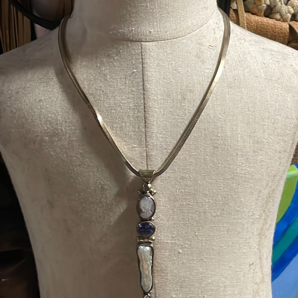 Sterling silver necklace and pendant with amethyst and mother of pearl